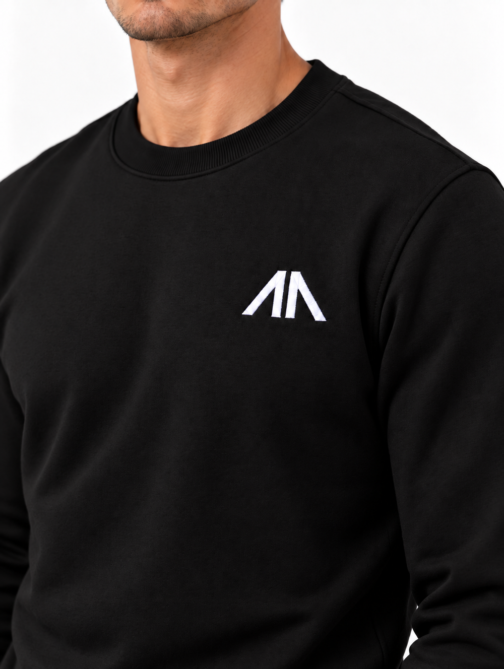 Close-up geborduurd Affinia logo op de borst